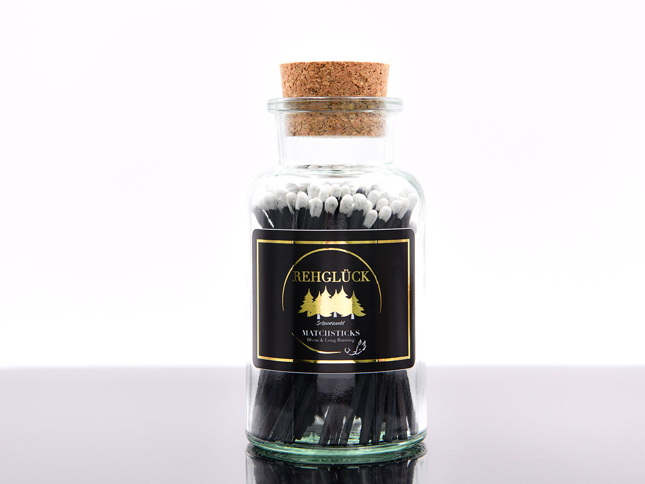 Apothekerflasche mit ca. 80 Stück schwarzen Streichhölzern
