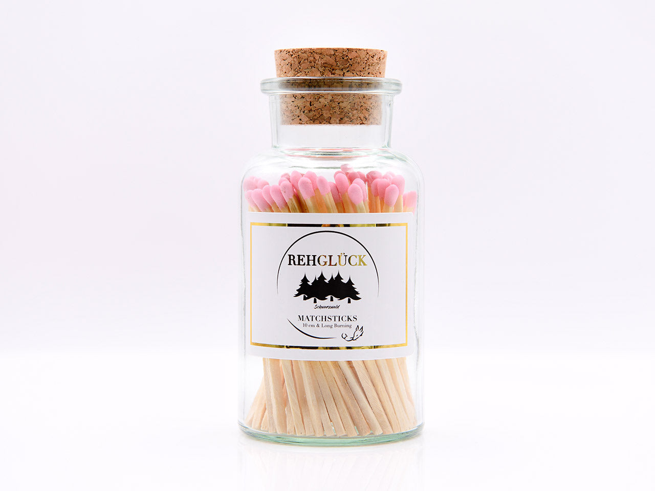 Apothekerflasche mit hellen Streichhölzern/Rosa