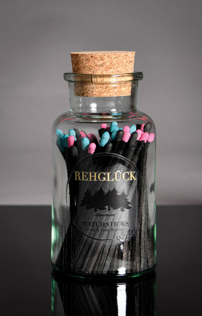 Apothekerflasche mit schwarzen Streichhölzern/Gemischt