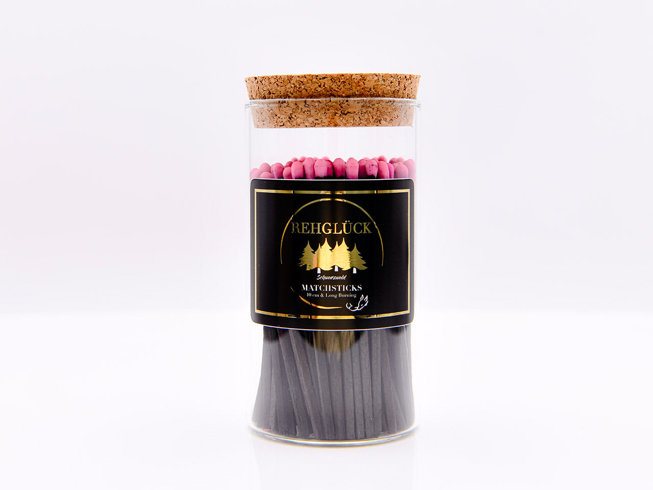 Zylinderglas schwarze Streichhölzer/pinker Kopf