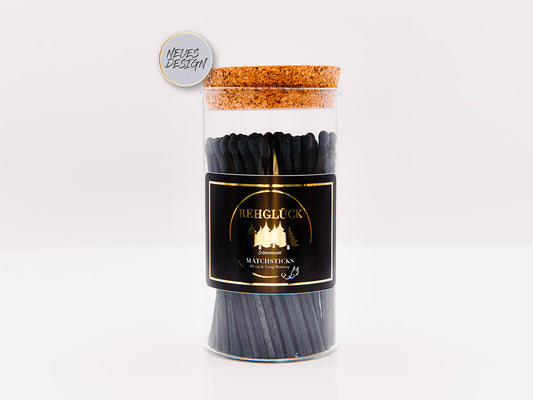 Zylinderglas schwarze Streichhölzer/schwarzer Kopf
